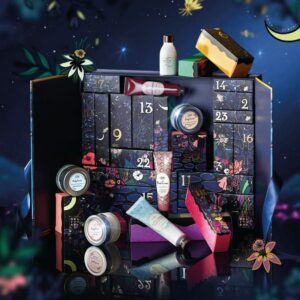 coffret beauté coloré et fleurit calendrier de l'avent Sabon 2023 avec produits soins visage, soins corps et cheveux gel douche gommage crème shampoing