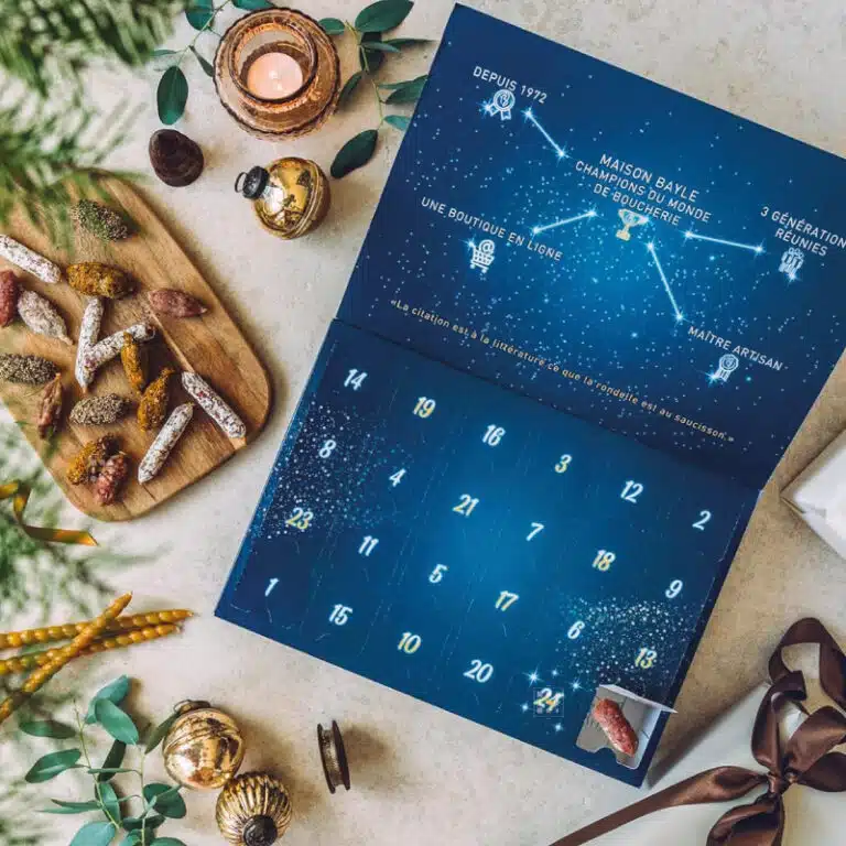 Calendrier de l'Avent Saucisson Ici Présent édition 2023 — packaging bleu étoilé Mini Saucissons Champions du Monde de Boucherie
