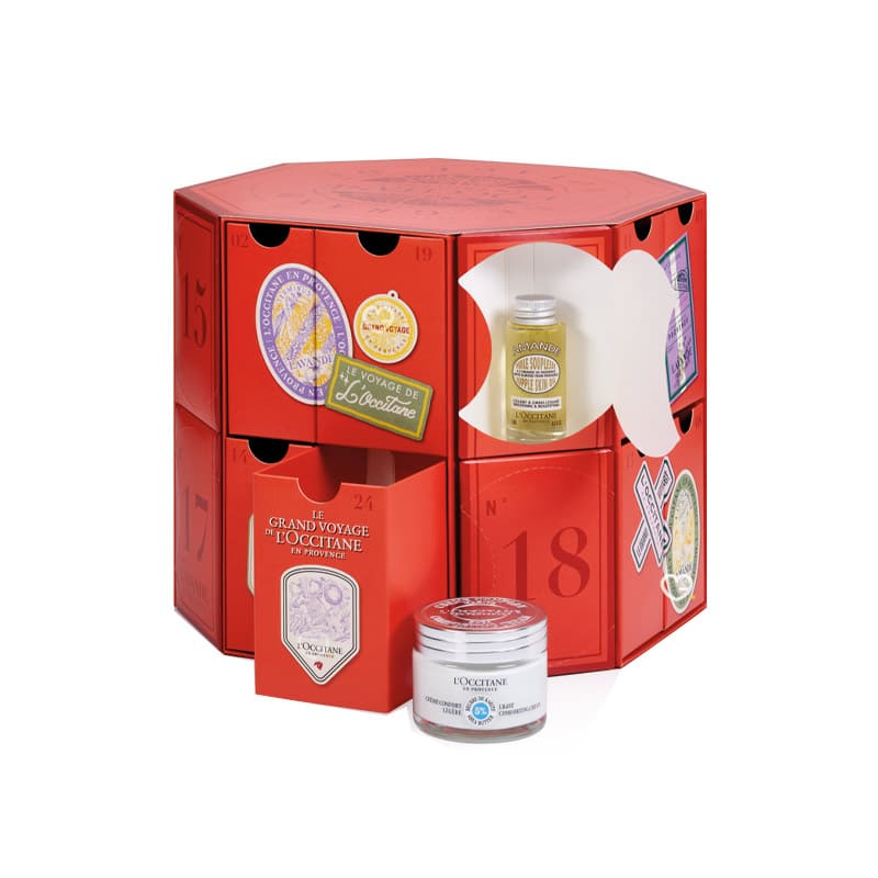 coffret beauté version luxe illustré toile de jouy calendrier de l'avent l'occitane 2024 avec 27 produits soins visage, corps et cheveux fabriqué en provence