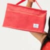 calendrier de l'avent Miin Cosmetics 2024 kbeauty coffret beauté présenté sous forme de trousse rouge XXL contenant soins et maquillage coréen