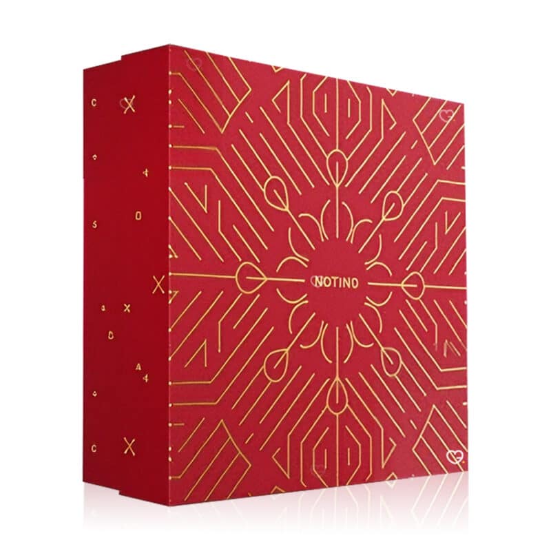 Coffret beauté rouge Calendrier de l'avent Notino 2024 contenant 24 produits de beauté multimarque soins visage corps cheveux maquillage