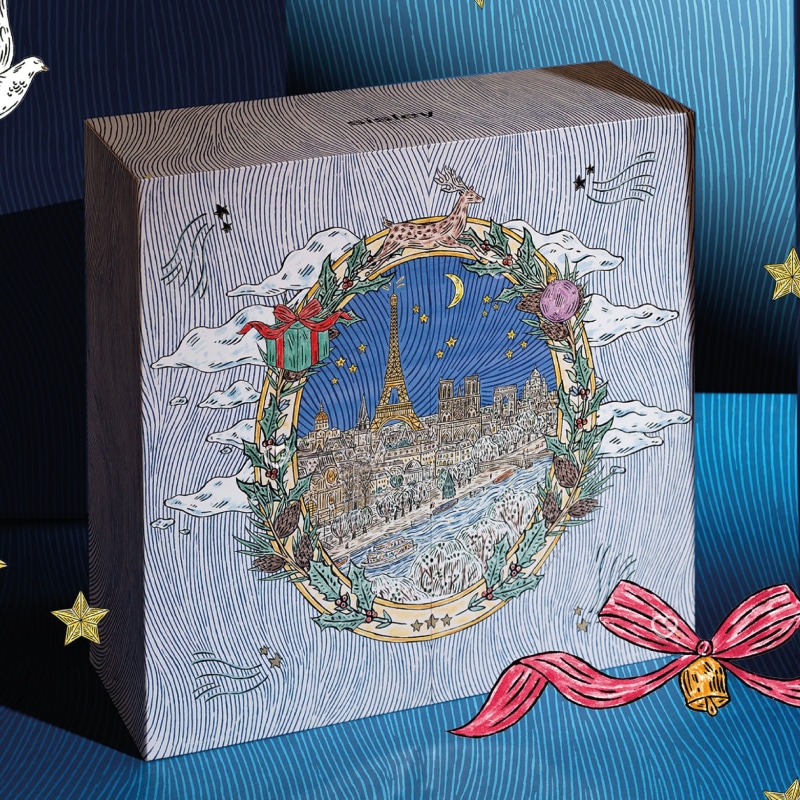 coffret beauté luxe dessin fee greening calendrier de l'avent sisley paris 2024 avec décor contenant des produits de beauté, soins cosmétiques, soins visage, maquillage et soins capillaire