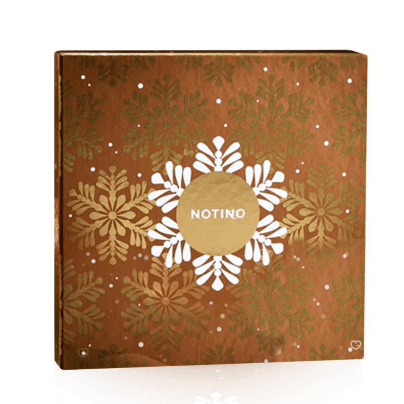 Calendrier de l’Avent Notino 2025 pour femme, coffret beauté multimarque élégant avec 24 soins visage, maquillage, parfums et produits cheveux.