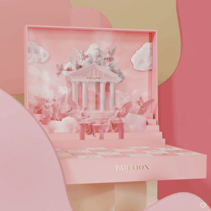 Coffret chocolat illustré Calendrier de l’Avent Fauchon 2025 contenant 24 chocolats et confiseries artisanales, packaging rosé pop-up luxueux et design pour gourmand