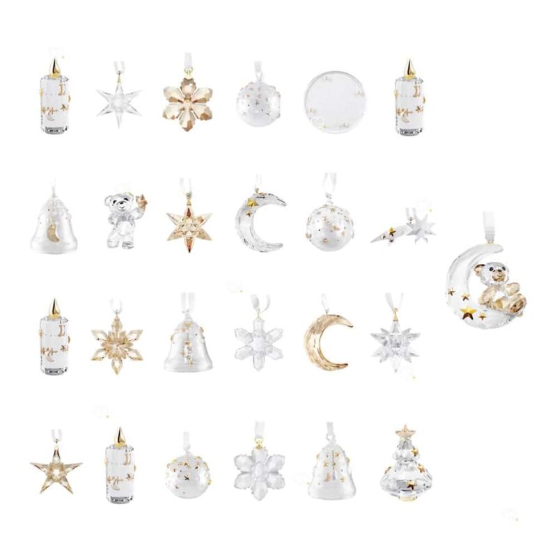 Les 25 ornements cristal du Calendrier de l'Avent Swarovski 2026 réunis : bougies, étoiles, flocons, lunes, cloches, ange, sapin, Kris Bear