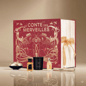 Calendrier de l’Avent Guerlain 2025 en coffret luxueux en forme de livre renfermant 25 produits beauté iconiques, parfums, soins, maquillage et bougie idéal cadeau femme luxe.