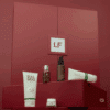 coffret beauté rouge calendrier de l'avent lookfantastic homme 2025 contenant 27 produits de soins corps visage et barbe pour homme