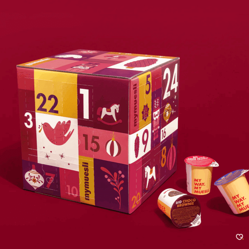 Calendrier de l’Avent mymuesli 2025 avec avec 24 mueslis bio variés dont 12 exclusifs, bons d’achat inclus, idéal pour adulte homme ou femme amateur de bio.