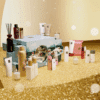 Calendrier de l’Avent Rituals Deluxe 2025 élégant, coffret doré renfermant 24 soins corps, cheveux, parfums d’intérieur et accessoires premium.