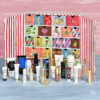 coffret beauté luxe calendrier de l'avent sisley paris 2025 avec décor contenant des produits de beauté, soins cosmétiques, soins visage, maquillage et soins capillaire d'une valeur de +1100 euros
