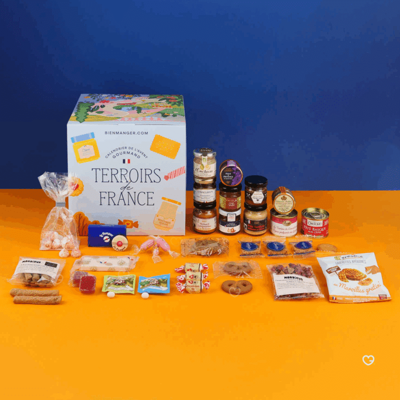 Calendrier de l’Avent Terroirs de France 2025 en cube festif, offrant 24 spécialités sucrées et salées régionales pour amateurs de gastronomie.