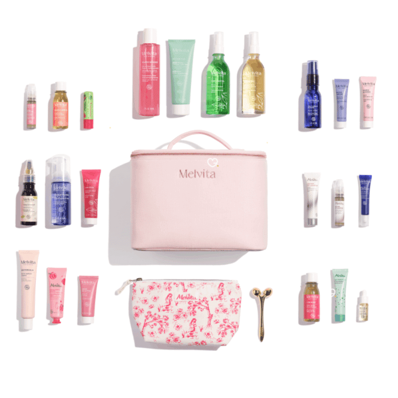 Calendrier de l’Avent Melvita 2025 contenant 24 soins bio visage, corps et cheveux dans une trousse rose écoresponsable pour femmes adeptes de beauté naturelle.