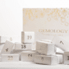 Calendrier de l’Avent Gemology 2025 contenant 24 soins beauté visage et corps en coffret luxe, idéal pour femme raffinée.