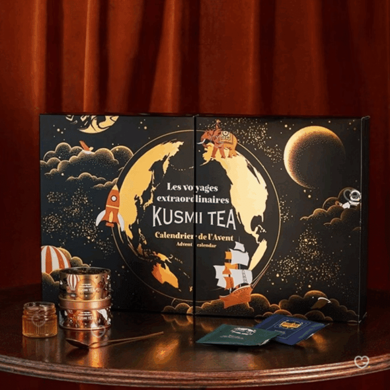 Coffret noir illustré voyage Calendrier de l’Avent Kusmi Tea 2025 avec 24 thés bio variés et infusions, cadeau pour amateurs de thé premium, homme ou femme