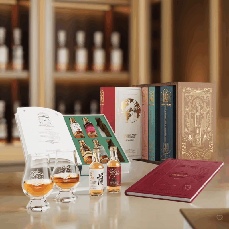 Coffret bois Calendrier de l’Avent Whisky 2025 Tour of the World 2025 contenant 24 whiskies premium, deux verres Glencairn et un livre pour amateurs exigeants.