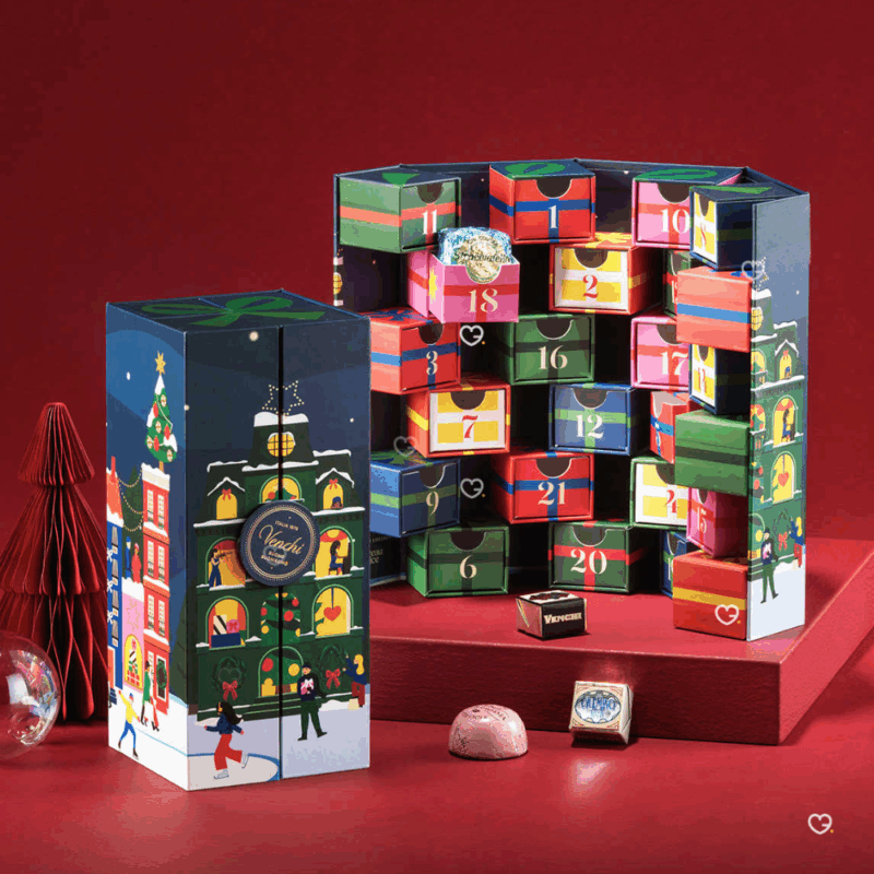 Calendrier de l’Avent Venchi 2025 en format livre renfermant 29 chocolats et pralines italiens raffinés, idéal pour amateurs de chocolat haut de gamme.