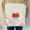 Calendrier de l’Avent Dammann Frères 2025 offrant 25 sachets de thé Cristal®, 24 recettes parfumées et créations festives pour amateurs de thé.