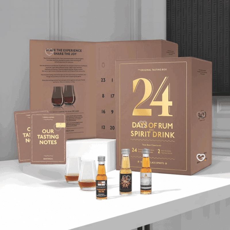 Calendrier de l’Avent 24 Days of Rum 2025 avec 24 fioles de rhum, 2 verres et carnets, coffret edition Mocha pour amateurs de spiritueux.