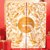 coffret beauté doré et blanc avec noeud calendrier de l'avent Glowria 2025 avec 25 produits de soins beauté multimarque pour visage corps et maquillage