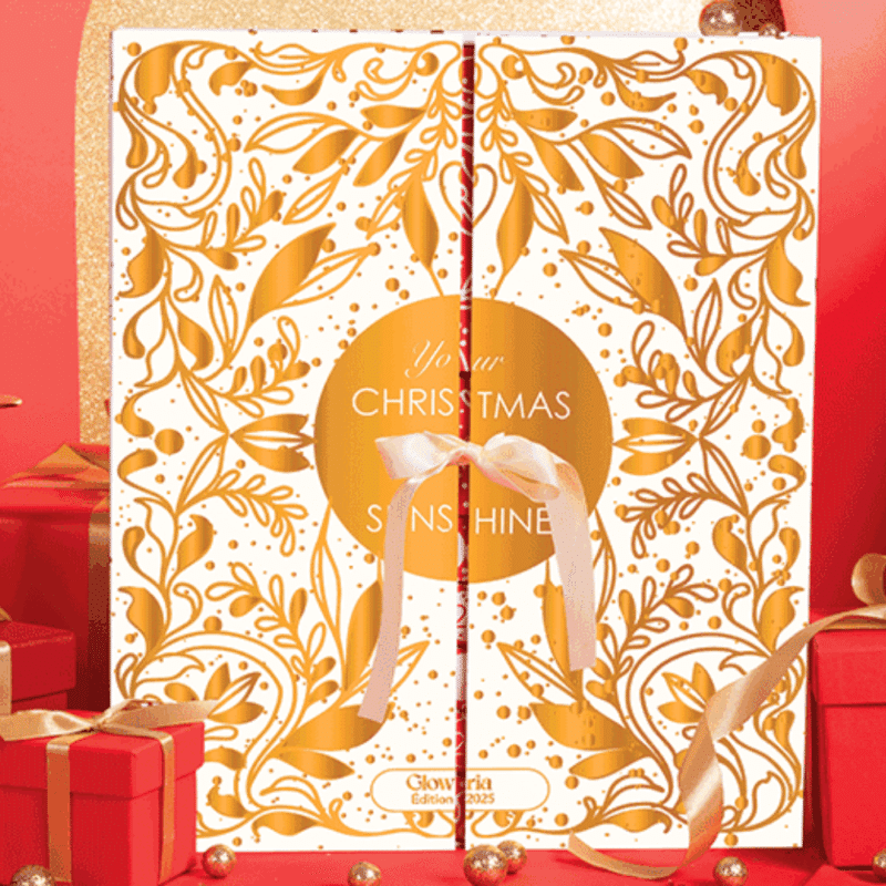 coffret beauté doré et blanc avec noeud calendrier de l'avent Glowria 2025 avec 25 produits de soins beauté multimarque pour visage corps et maquillage