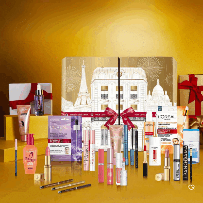 Calendrier de l'Avent L'Oréal Paris 2025 contenant 24 produits de beauté en taille réelle pour le maquillage et les soins du visage présenté dans un coffret élégant doré et blanc
