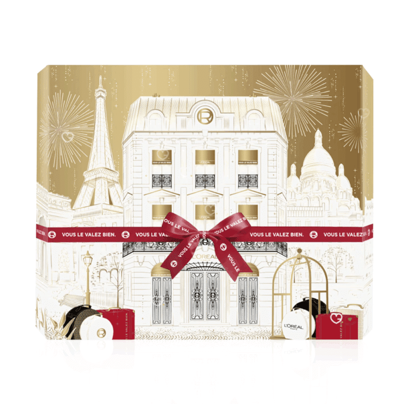 Calendrier de l'Avent L'Oréal Paris 2025 contenant 24 produits de beauté en taille réelle pour le maquillage et les soins du visage présenté dans un coffret élégant doré et blanc