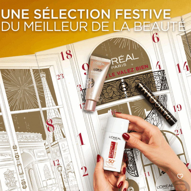 Calendrier de l'Avent L'Oréal Paris 2025 contenant 24 produits de beauté en taille réelle pour le maquillage et les soins du visage présenté dans un coffret élégant doré et blanc