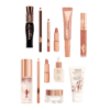 contenu complet du Calendrier de l'avent Charlotte Tilbury en forme de coffret trésor contenant 12 produits de beauté luxueux