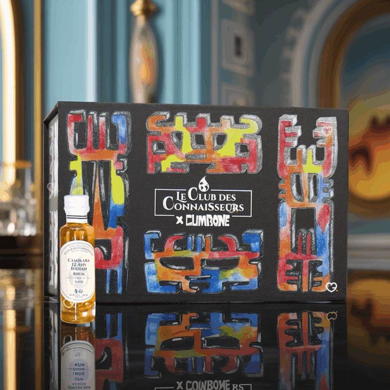Calendrier de l’Avent Rhum Le Club des Connaisseurs 2025, coffret Cumbone design incluant 24 fioles de 20ml de rhums du monde et fiches de dégustation pour adulte amateurs de spiritueux.