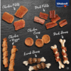 Calendrier de l’Avent Vitakraft Chien 2025 avec 24 friandises saines aux saveurs variées, coffret festif pour propriétaires de chiens.