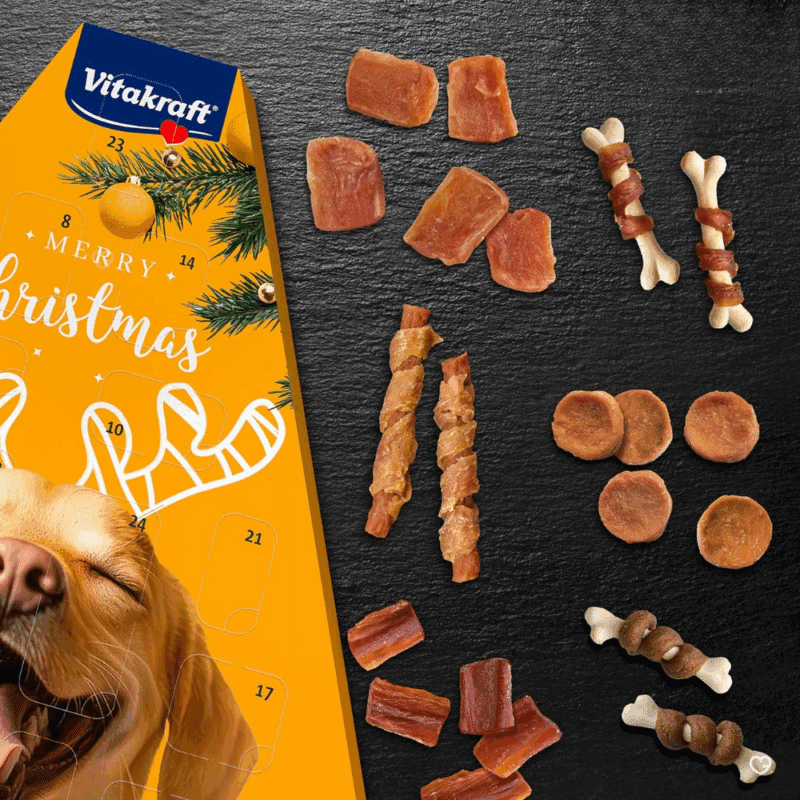Calendrier de l’Avent Vitakraft Chien 2025 avec 24 friandises saines aux saveurs variées, coffret festif pour propriétaires de chiens.