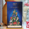 Coffret Lindt XXL Calendrier de l’Avent Lindt Géant 2025 avec 24 chocolats et confiseries en format taille réelle, coffret rouge généreux idéal pour famille, couple et amateur de chocolat.