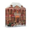 Calendrier de l'Avent Rituals Classique 2026, coffret en forme de maison de ville en briques rouges enneigee, ferme sur fond blanc