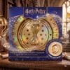 Boîte officielle du Calendrier de l'Avent Harry Potter Spinning Time Turner 2026 The Carat Shop, fond bleu Warner Bros.