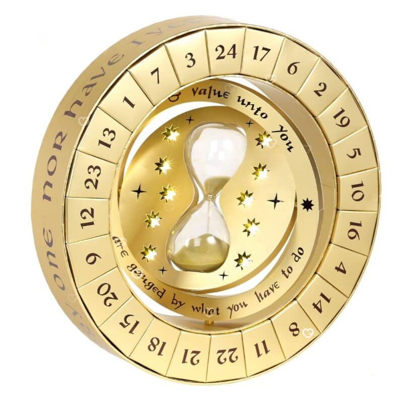 Calendrier de l'Avent Harry Potter Time Turner 2026, présentoir Retourneur de Temps circulaire doré The Carat Shop
