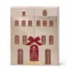 Calendrier de l'Avent Catrice House Of Gold 2026, boite fermee en forme de maison doree avec 24 portes et noeud rouge