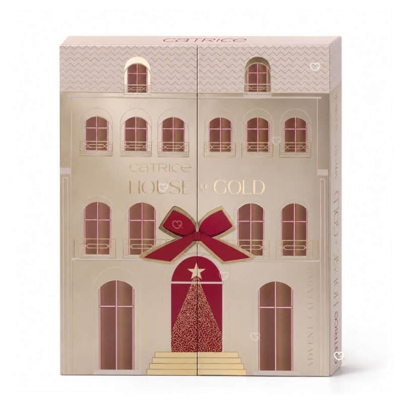Calendrier de l'Avent Catrice House Of Gold 2026, boite fermee en forme de maison doree avec 24 portes et noeud rouge