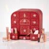 Boite ouverte du calendrier de l Avent Charlotte Tilbury 2026, tiroirs et produits visibles