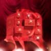 Coffret Charlotte Tilbury 2026 avec ruban rouge, ambiance de Noel