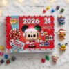 Calendrier de l'Avent Funko Pocket POP Disney 2026 entouré d'ornements de Noël