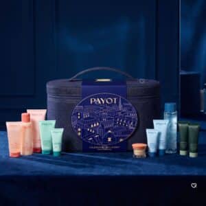 Les 24 soins du calendrier de l'Avent beauté Payot 2026 disposés autour de la trousse