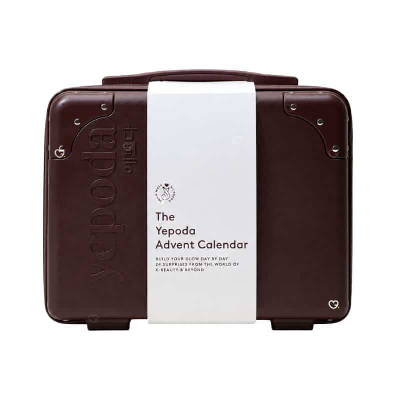 Calendrier de l Avent Yepoda 2026, valise rigide bordeaux prune fermee sur fond blanc