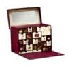 Calendrier de l'Avent Yves Rocher Premium 2026, coffret bordeaux a 24 tiroirs numerotes avec miroir integre, ouvert