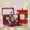 Calendrier de l'Avent Yves Rocher Premium 2026 presente ouvert et dans sa boite fermee rouge de Noel