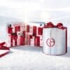Calendrier de l Avent Armani Beauty 2026 ouvert dans un décor de neige, coffret panettone argenté et rouge
