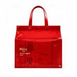 Calendrier de l'Avent MiiN Cosmetics 2026, cabas en vinyle rouge translucide reutilisable